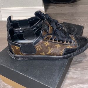 Authentic Louis Vuitton sneakers size 7.5. Can fit up to size 9.